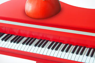 piano in the shape of a tomato