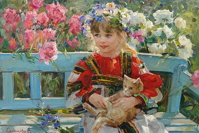 Niña con gatito