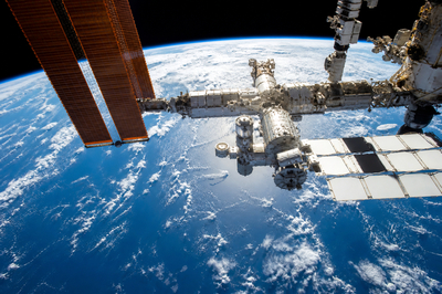 Iss Over Sunlit Earth(grok)