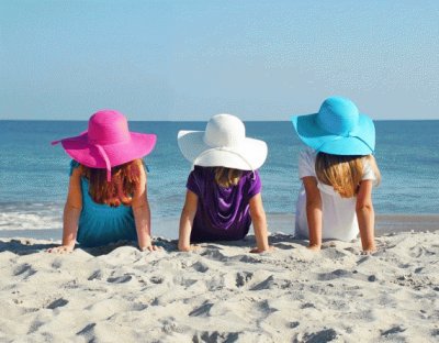 Girls in Floppy Easter Hats at the Beach