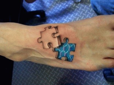jigsaw piece foot tattoo