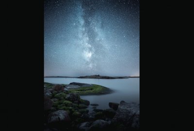 פאזל של Noche estrellada desde la orilla - Finlandia Nocturna