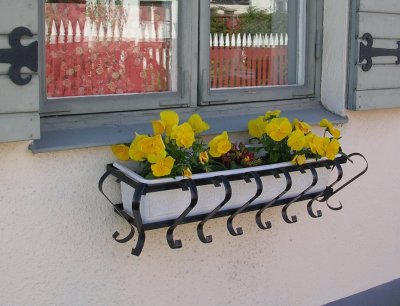 Yellow flower box and window, Gotland jigsaw puzzle