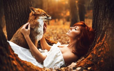 redhead girl with fox