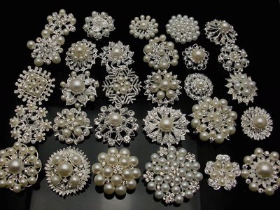 broches de perlas