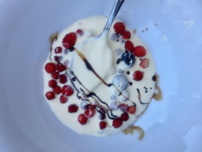 Berries in cream with balsamic drizzle
