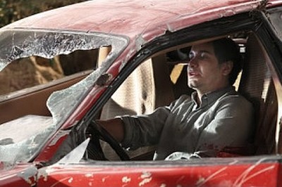 Walt in the car on the side of the cliff!- Postcar