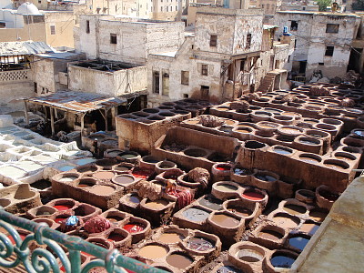 Vats of fabric dye at factory in Morocco