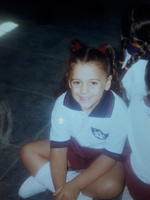 This is me when I was 5 years old. I went to Santa Teresa school