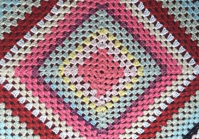 crocheted rug- pink center