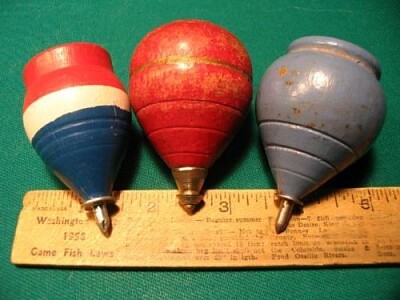 large wooden spinning tops