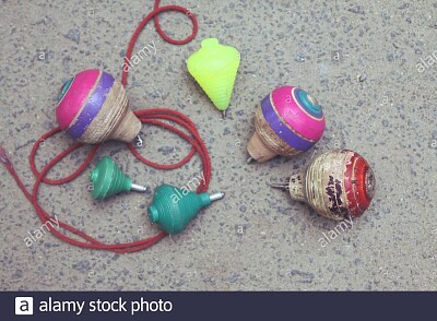 Classic wooden spinning top toy with string