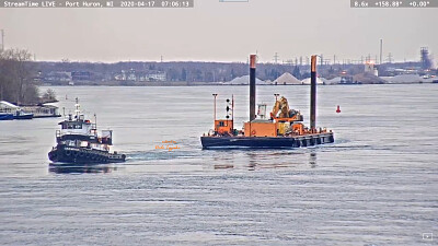 tug  "Champion " pulling spud-barge barge Kokosing-1