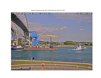 פאזל של Crane being pulled down the St Clair River