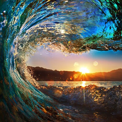 Sunrise through wave