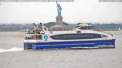 NYC Ferry in front of the Statue of Liberty Aug 20