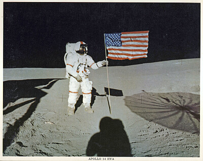 David Scott and flag on moon