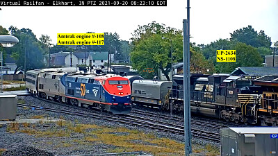 Amtrak engines 108 and 117 overtaking oil tanker train, Elkhart,IN/USA
