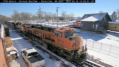 BNSF-6814 passing thru Parkville,MO/USA in the SNOW jigsaw puzzle