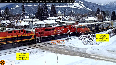 CN-2945, CN-3969 meets CP-7059   KCS-5012 at Revelstoke, in the Snow