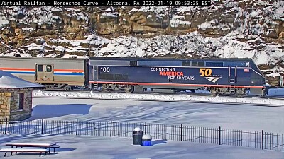 Amtrak engine #-100 leading train #-42 around Horseshoe Curve,PA/USA jigsaw puzzle