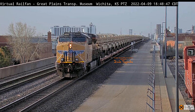 UP-8046 towing military equipment at Wichita,KS/USA