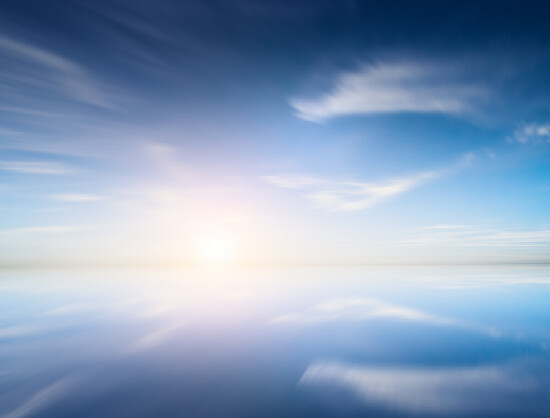 Sunrise mirroring at sea