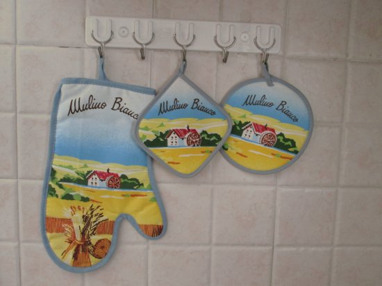 Agarraderas de cocina de regalo con las compras