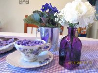 Tea Cup and Purple Bottle