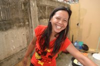 Smiling and doing Laundry