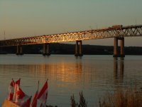 Centennial Bridge Miramichi in setting sun L